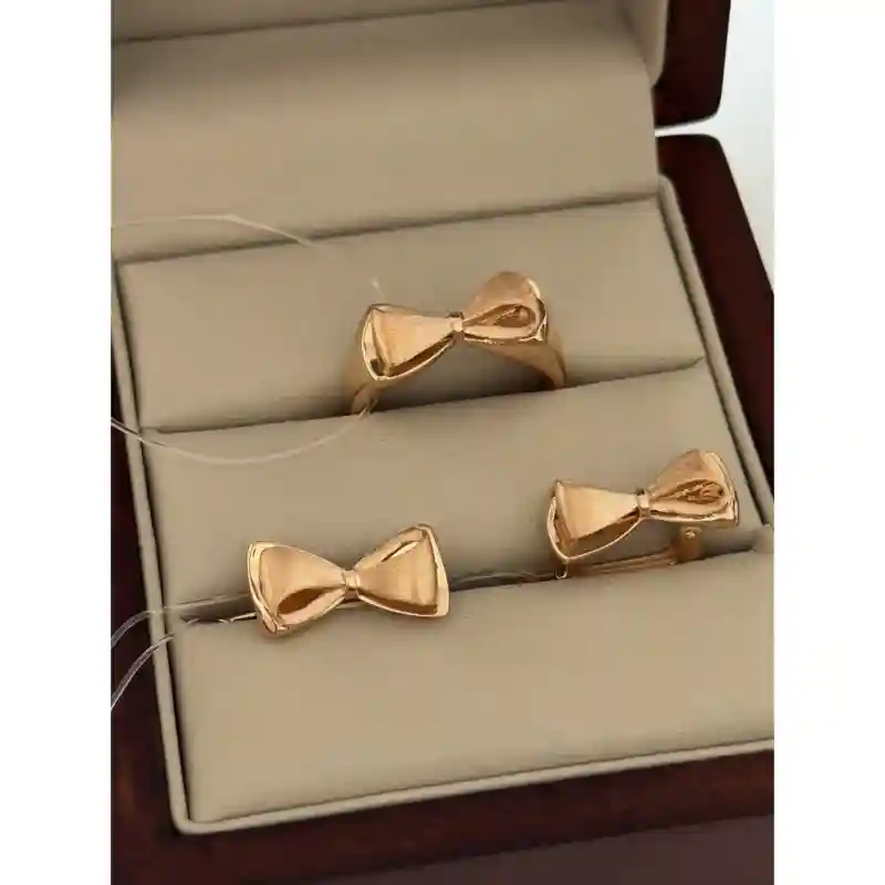 14677 Комплект из жёлтого золота 14К с бантиками