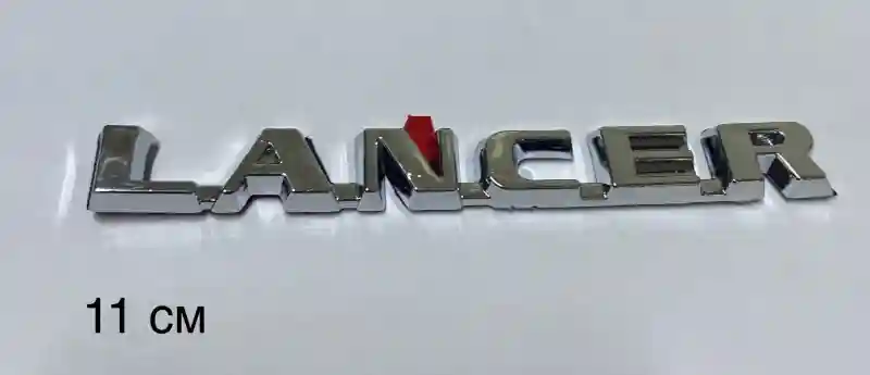 Шильдик ML110-948 Mitsubishi Lancer